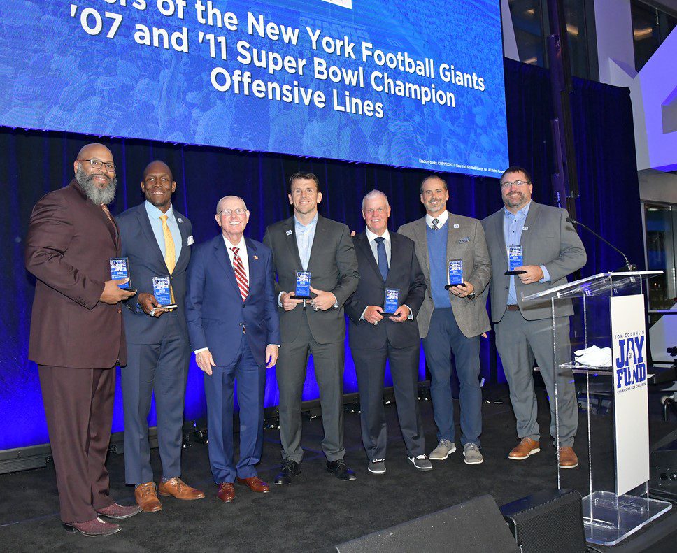 Giants offensive line with Coach Tom Coughlin