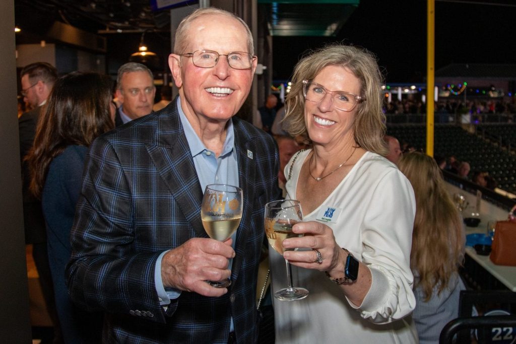 Keli and Coach Coughlin at the Wine Tasting Gala